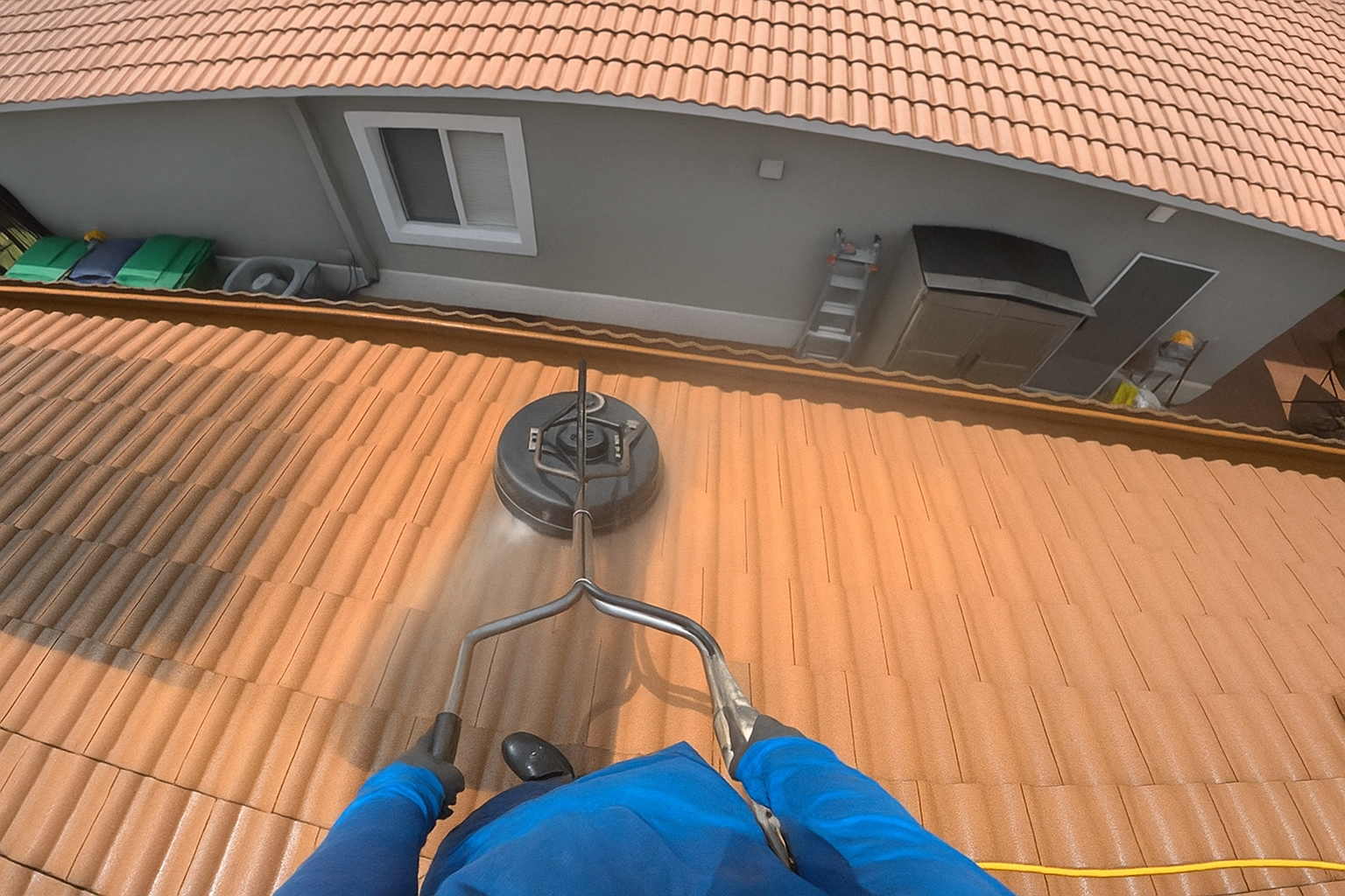 Rotary pressure washer on tile roof in miami